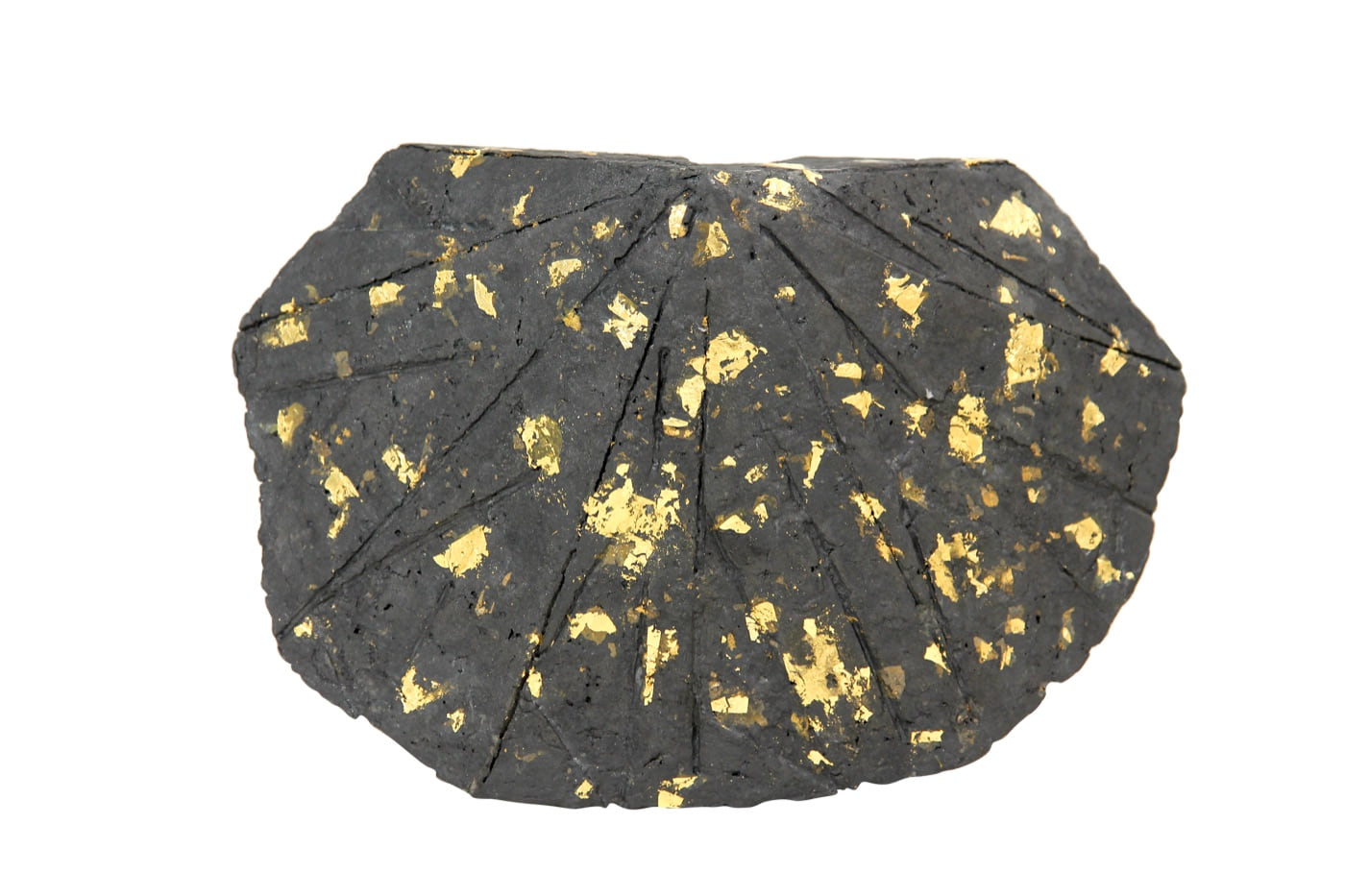 Shelter, a dark low cast-paper sculpture flecked with gold leaf, by Zarina