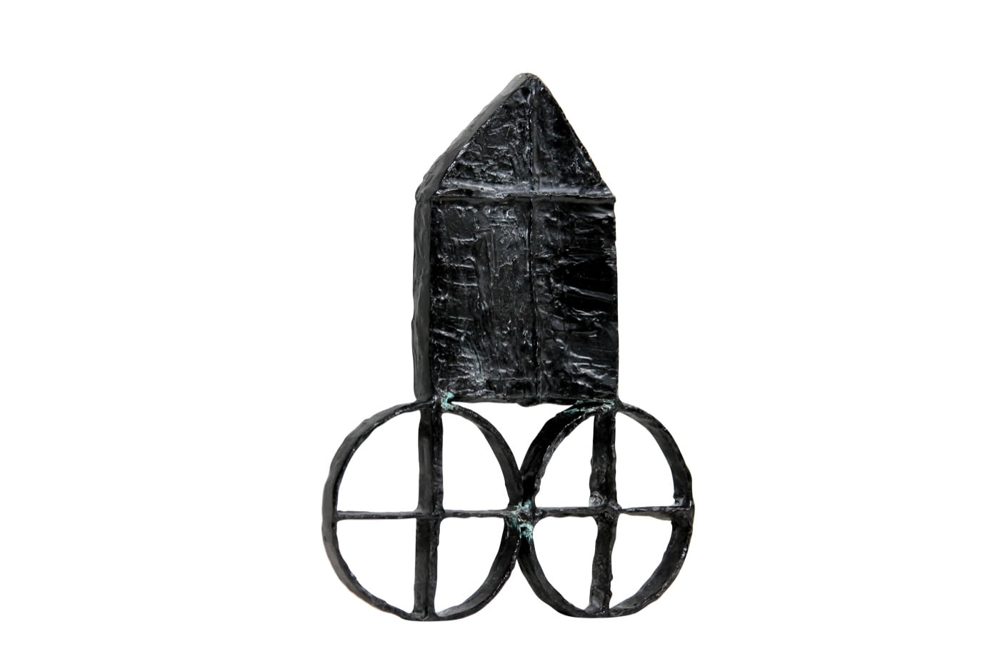 House on Wheels I, a dark cast and painted aluminium house form mounted on two open wheels, by Zarina